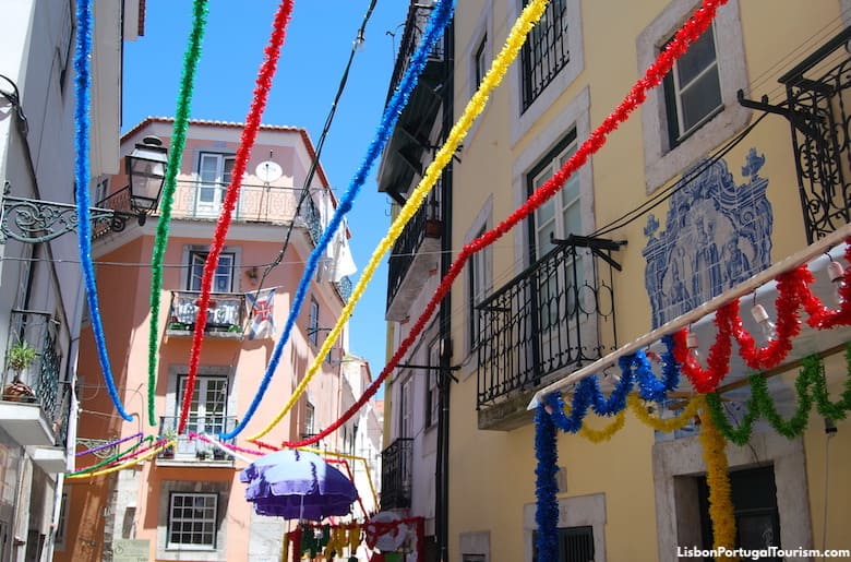 Street in Alfama decorated for the street festivals of Festas de Lisboa, Lisbon