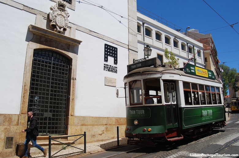 Tram passing by Museu do Aljube in Alfama, Lisbon